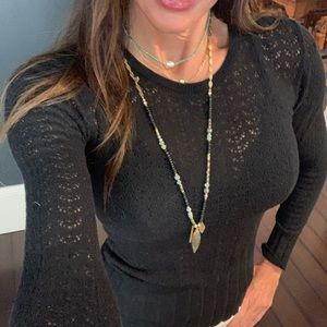 CAbi black pointelle fitted sweater.